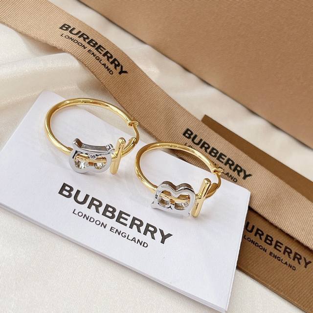 Burberry耳钉 中文商标 巴宝丽 帛柏莉 成为了一个最能代表英国的品牌 Burberry创办于1856年 是英国皇室御用品 优雅大方精工设计 雕刻 非常修